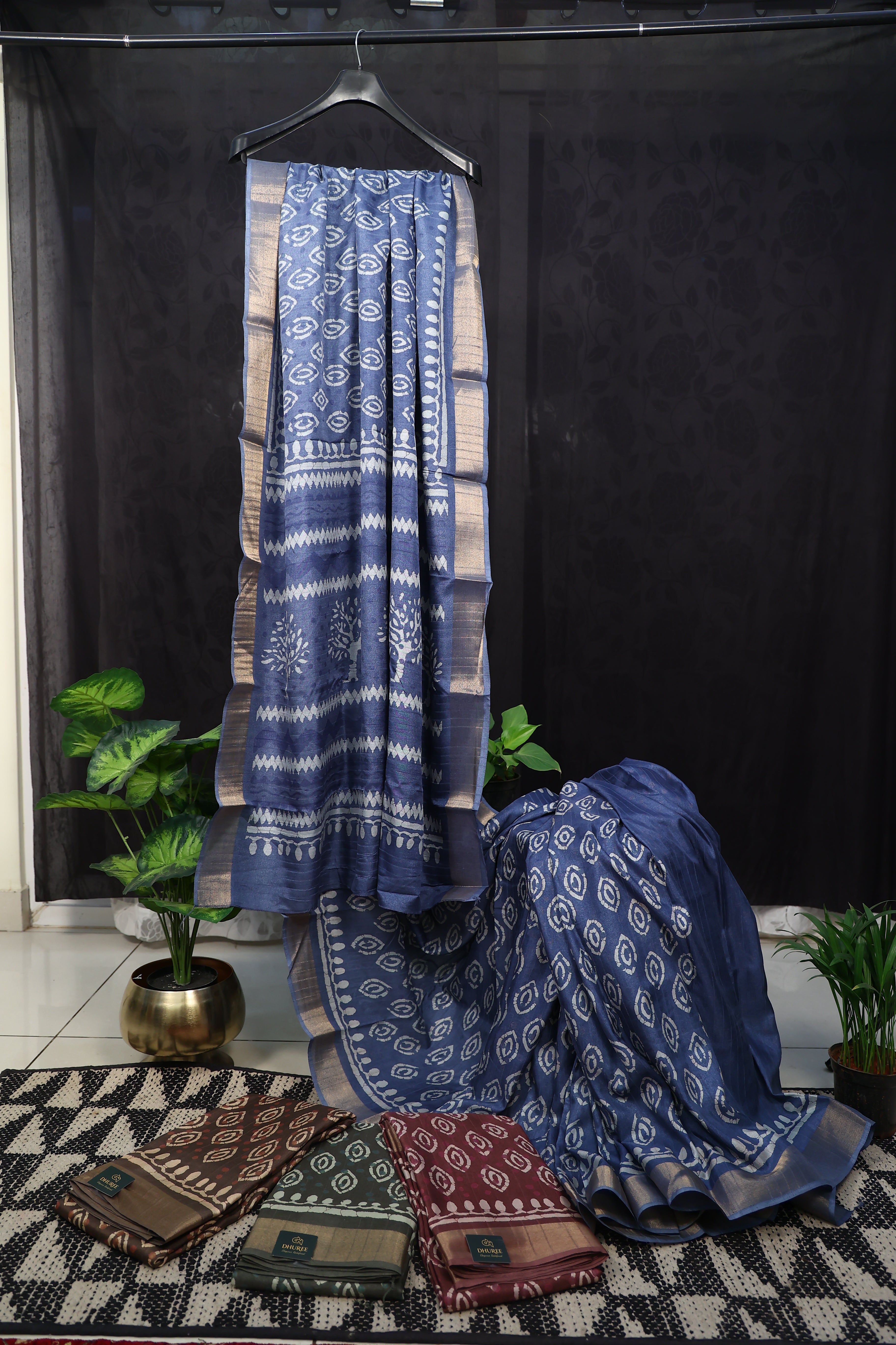- DHUREE HANDLOOM SILK.