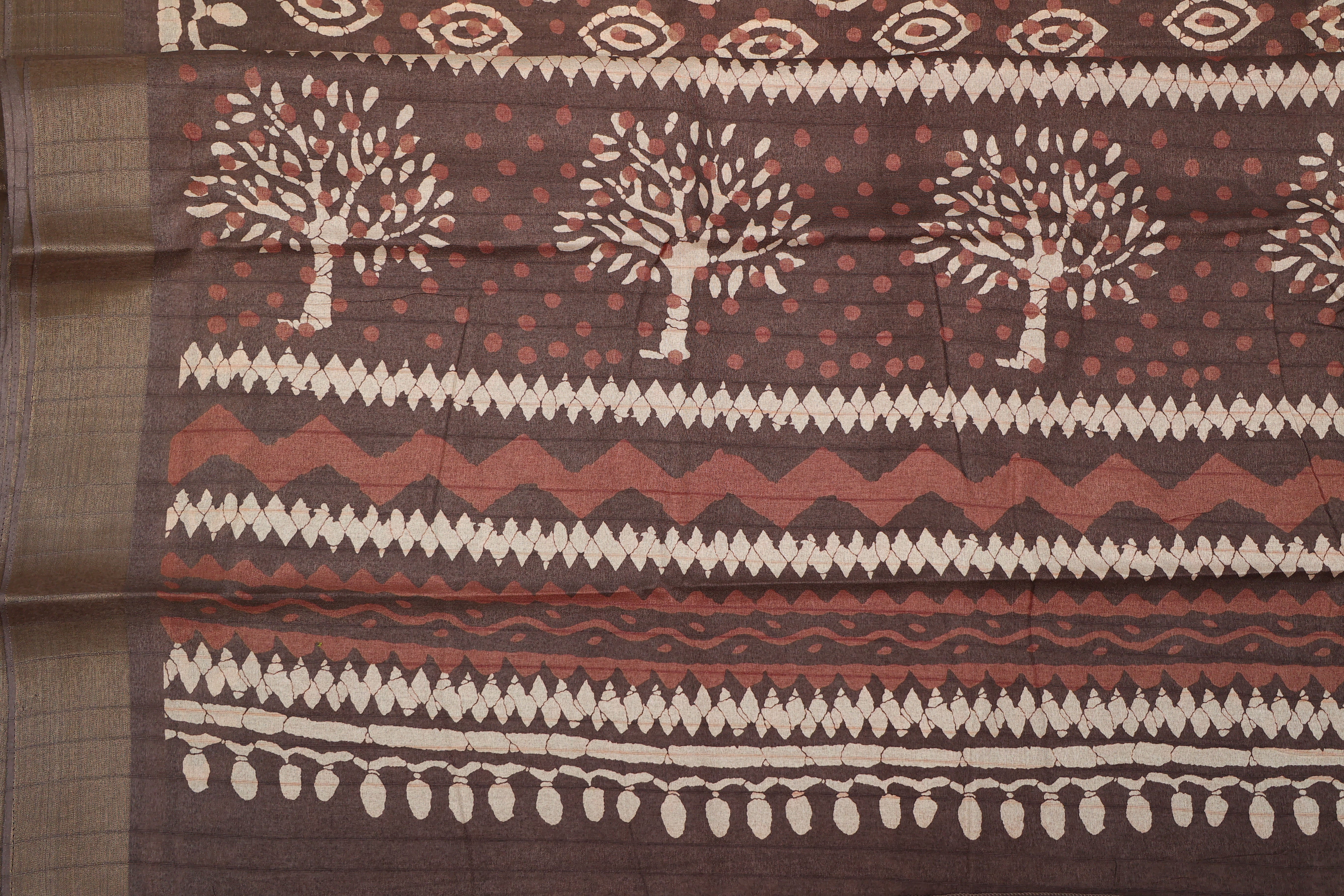 - DHUREE HANDLOOM SILK.