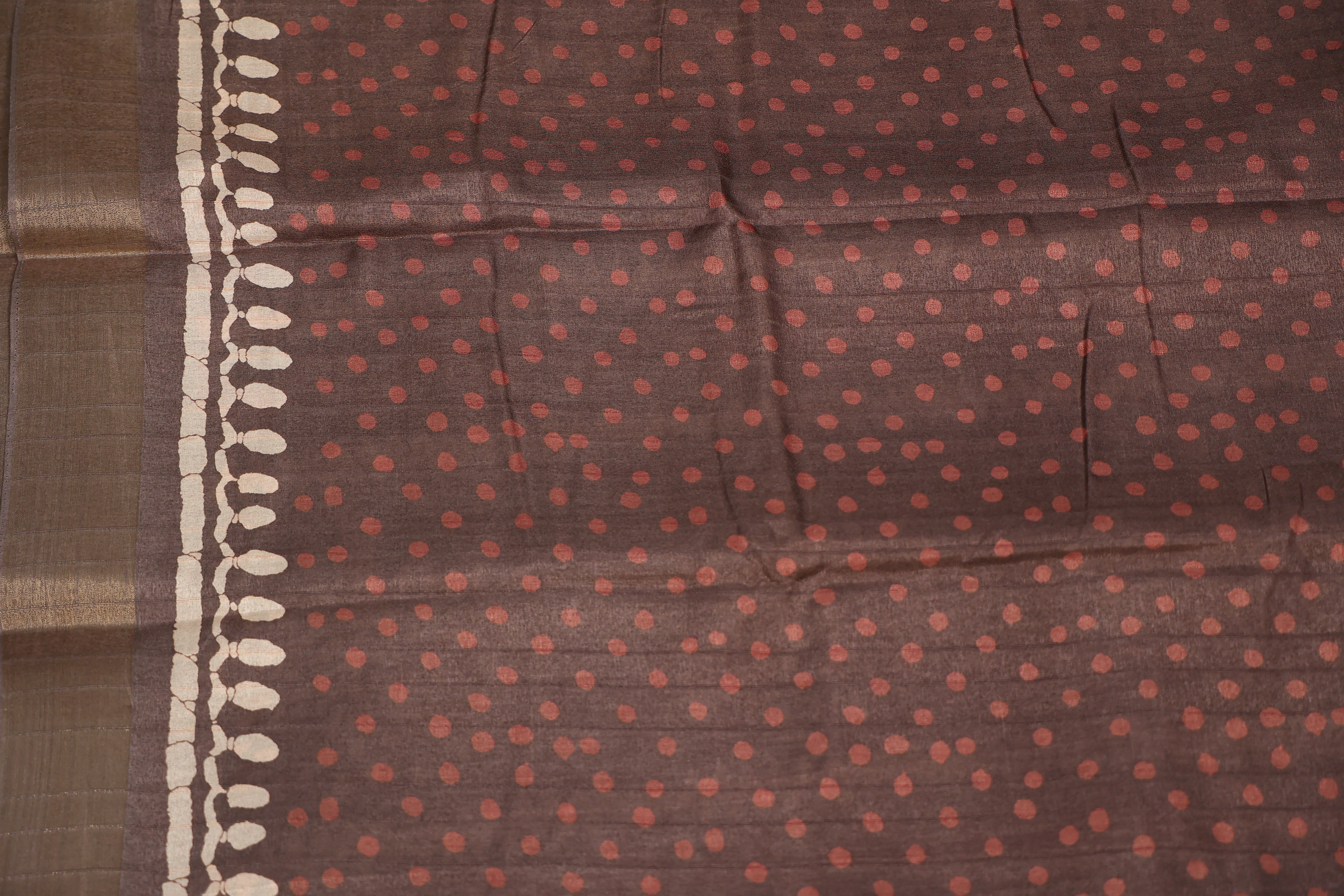 - DHUREE HANDLOOM SILK.