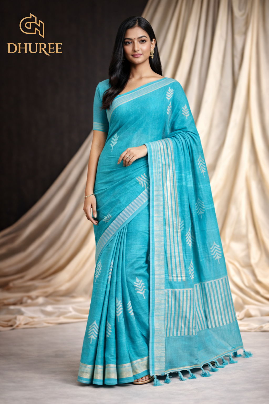 - DHUREE LINEN SAREE.