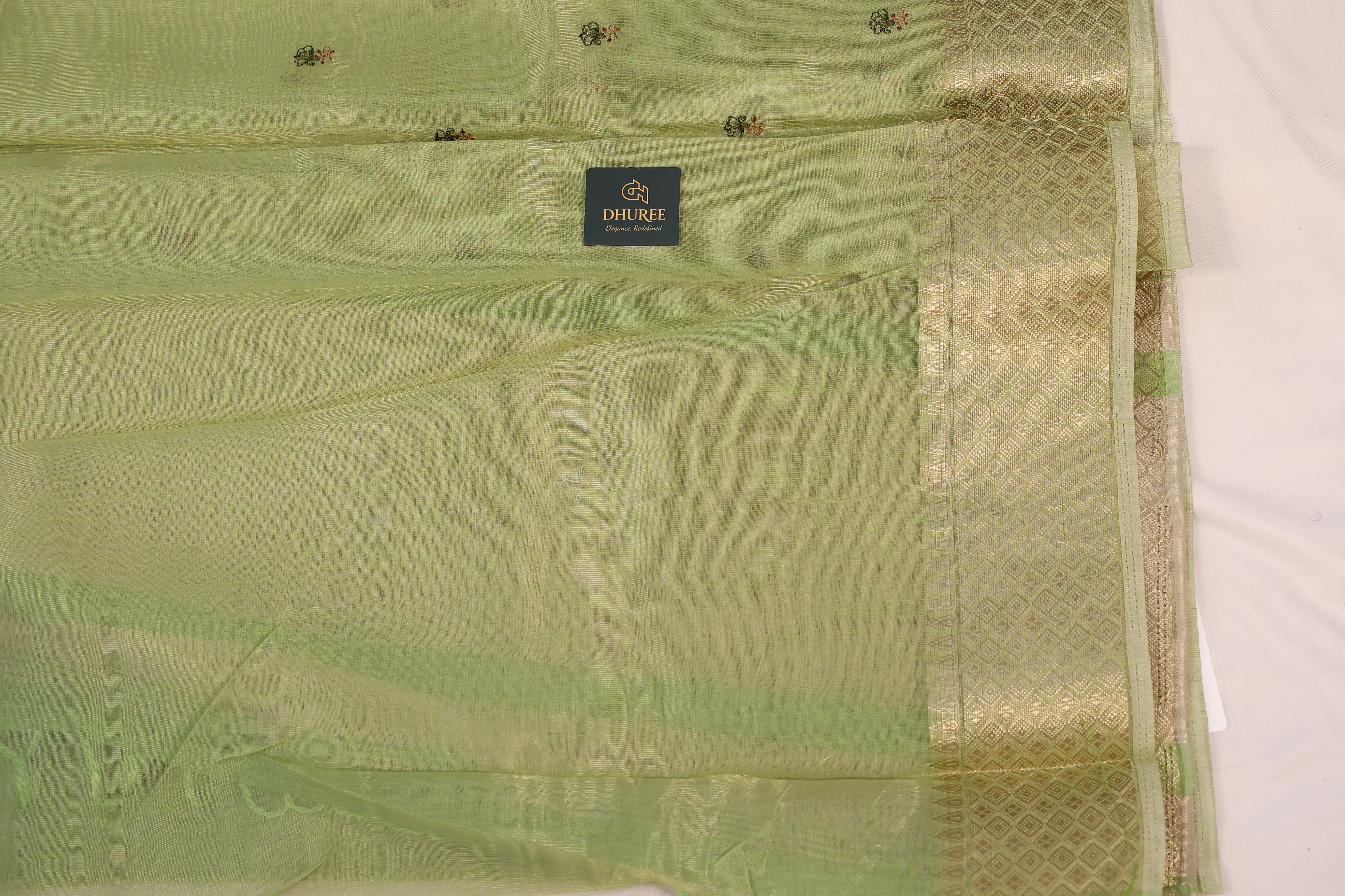 - DHUREE LINEN SAREE.