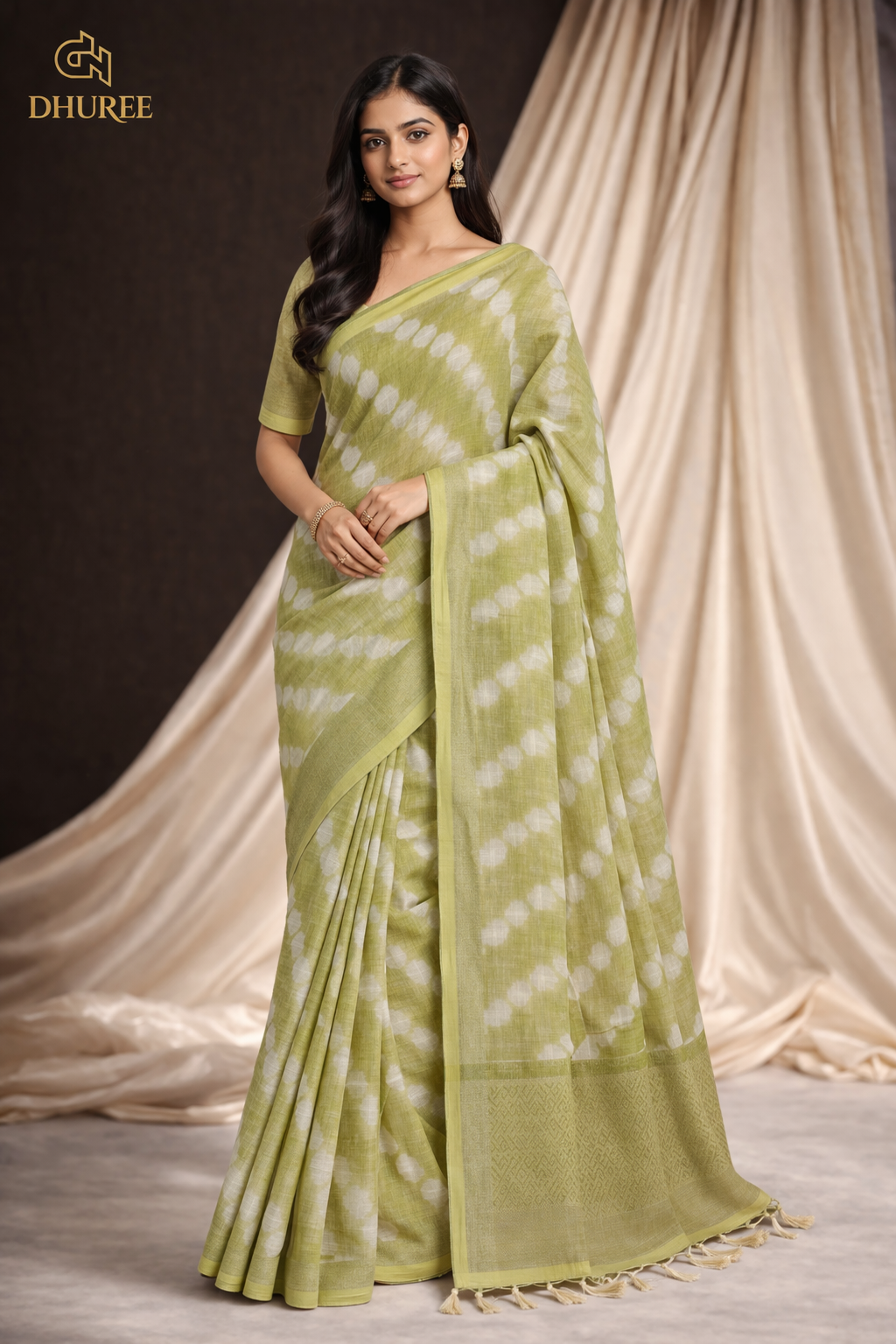 - DHUREE LINEN SAREE.