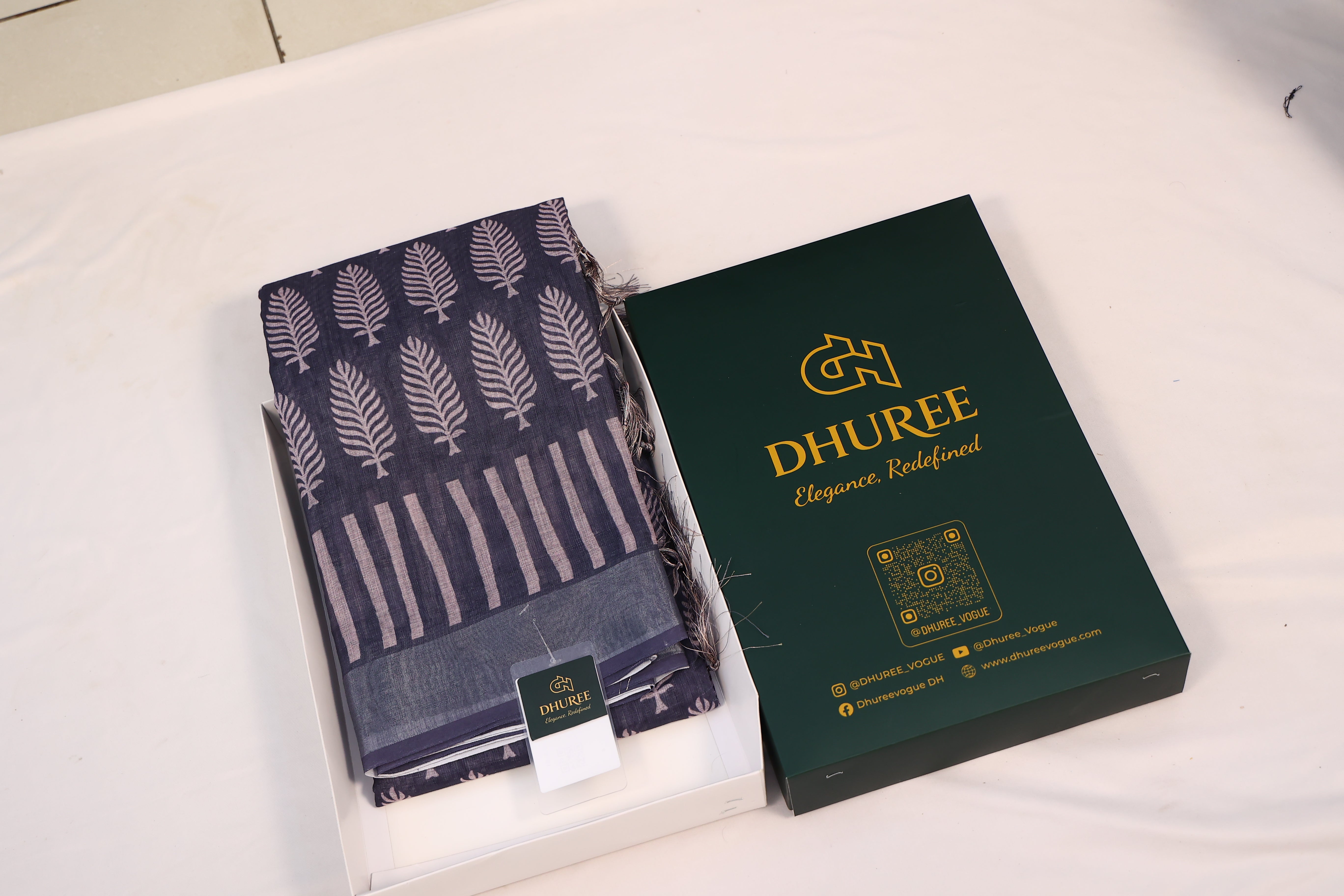 - DHUREE LINEN SAREE.