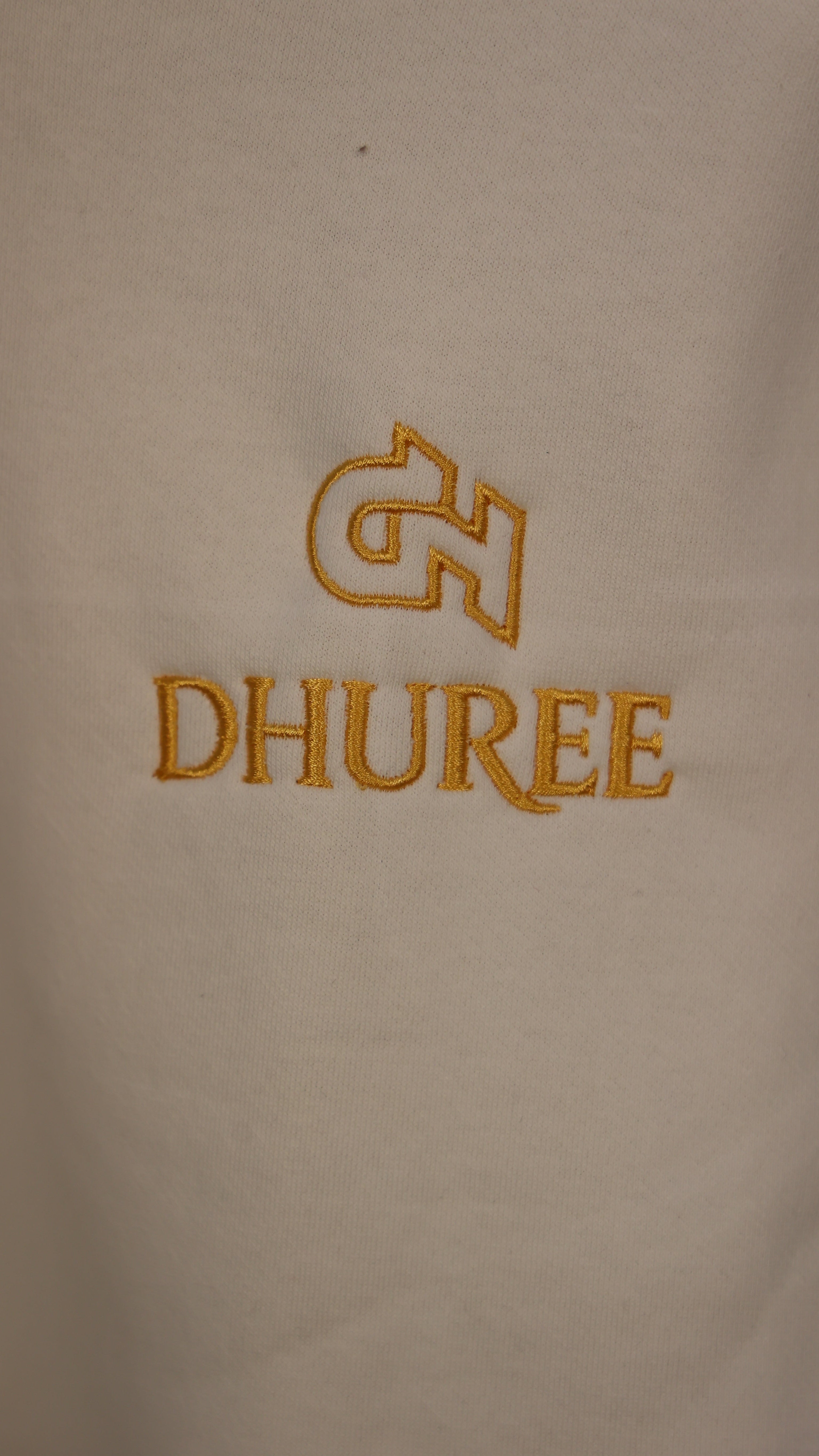 White unisex premium hoodie with Logo Embroidery.